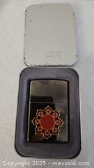 MaxSold Auction: Sunburst Zippo Lighter - Riverview (Florida, USA) SELLER MANAGED Downsizing Online Auction - Holly Heath Drive