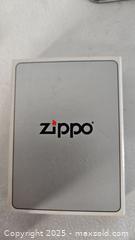MaxSold Auction: Sunburst Zippo Lighter - Riverview (Florida, USA) SELLER MANAGED Downsizing Online Auction - Holly Heath Drive