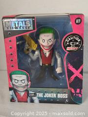 MaxSold Auction: The Joker Boss Metsl Die Cast Figure - Riverview (Florida, USA) SELLER MANAGED Downsizing Online Auction - Holly Heath Drive