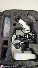 MaxSold Auction: TV Scientific Research Microscope - Riverview (Florida, USA) SELLER MANAGED Downsizing Online Auction - Holly Heath Drive