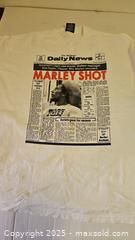 MaxSold Auction: Zion &#34;Bob Marley Shot&#34; T-Shirt - Riverview (Florida, USA) SELLER MANAGED Downsizing Online Auction - Holly Heath Drive
