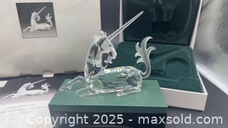 MaxSold Auction: Swarovski unicorn with box, certificate and stand - Markham (Ontario, Canada) SELLER MANAGED Downsizing Online Auction - Loring Crescent
