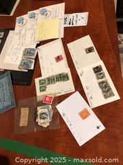 MaxSold Auction: Postage Stamps and Coins with Carrying Case  - Ottawa (Ontario, Canada) PARTNER MANAGED Estate Sale Online Auction - South River Drive