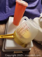 MaxSold Auction: Good Ol' Tupperware - Mesa (Arizona, USA) SELLER MANAGED Downsizing Online Auction - South 96th Street