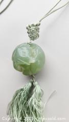 MaxSold Auction: Carved vintage natural Jade ball depicting a lucky elephant looking backwards in typical pose - New Westminster (British Columbia, Canada) SELLER MANAGED Downsizing Online Auction -  Hamilton Street