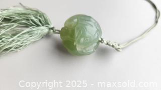 MaxSold Auction: Carved vintage natural Jade ball depicting a lucky elephant looking backwards in typical pose - New Westminster (British Columbia, Canada) SELLER MANAGED Downsizing Online Auction -  Hamilton Street