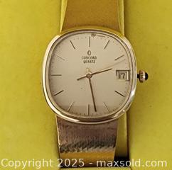 MaxSold Auction: Concord Quartz Gold-Tone Cushion Case Watch, Silver-Champagne Dial - St. Petersburg (Florida, USA) SELLER MANAGED Estate Sale Online Auction - Sunshine Skyway Lane South (CONDO)