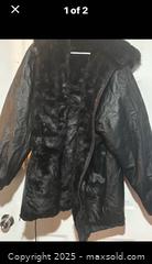 MaxSold Auction: A black vintage leather coat with a genuine fur lining and collar. Reversible  - Hiram (Georgia, USA) SELLER MANAGED Reseller Online Auction - Hiram Acworth Highway (STORAGE)
