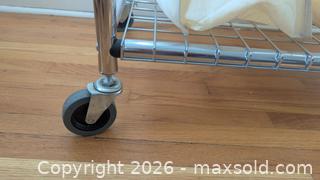 MaxSold Auction: Chrome Frame 3-Bag Laundry Sorter Cart with Swivel Casters - Toronto (Ontario, Canada) SELLER MANAGED Downsizing Online Auction - Ferris Road