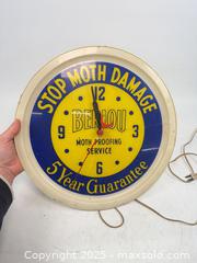 MaxSold Auction: Antique BERLOU moth proofing service advertising clock - Concord (California, USA) SELLER MANAGED Estate Sale Online Auction - Landana Drive