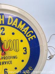 MaxSold Auction: Antique BERLOU moth proofing service advertising clock - Concord (California, USA) SELLER MANAGED Estate Sale Online Auction - Landana Drive