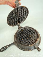 MaxSold Auction: Antique late 1800s Griswold cast-iron waffle iron - Concord (California, USA) SELLER MANAGED Estate Sale Online Auction - Landana Drive