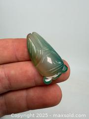 MaxSold Auction: Carved green Calchedony cicada pendant - Concord (California, USA) SELLER MANAGED Estate Sale Online Auction - Landana Drive