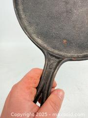 MaxSold Auction: Early to mid 1800s cast-iron number seven gate marked griddle - Concord (California, USA) SELLER MANAGED Estate Sale Online Auction - Landana Drive