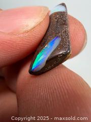 MaxSold Auction: Genuine Australian fire opal specimen with two opals - Concord (California, USA) SELLER MANAGED Estate Sale Online Auction - Landana Drive