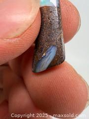 MaxSold Auction: Genuine Australian fire opal specimen with two opals - Concord (California, USA) SELLER MANAGED Estate Sale Online Auction - Landana Drive