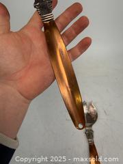 MaxSold Auction: Pair mid-century modern silver plate and copper copper craft guild salad utensils - Concord (California, USA) SELLER MANAGED Estate Sale Online Auction - Landana Drive