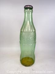 MaxSold Auction: Vintage giant Coca-Cola bottle piggy bank - Concord (California, USA) SELLER MANAGED Estate Sale Online Auction - Landana Drive
