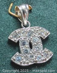 MaxSold Auction: 10K(0.8g),  CZ PENDANT - Toronto (Ontario, Canada) PARTNER MANAGED Downsizing Online Auction - Queen Street East