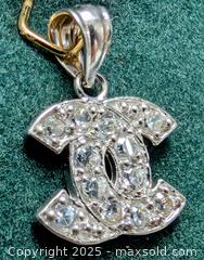 MaxSold Auction: 10K(0.8g),  CZ PENDANT - Toronto (Ontario, Canada) PARTNER MANAGED Downsizing Online Auction - Queen Street East
