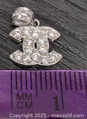 MaxSold Auction: 10K(0.8g),  CZ PENDANT - Toronto (Ontario, Canada) PARTNER MANAGED Downsizing Online Auction - Queen Street East