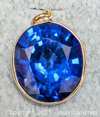 MaxSold Auction: 10K(3.23g), LAB SAPPHIRE ROYAL BLUE (15.1ct) PENDANT - Toronto (Ontario, Canada) PARTNER MANAGED Downsizing Online Auction - Queen Street East