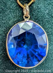 MaxSold Auction: 10K(3.23g), LAB SAPPHIRE ROYAL BLUE (15.1ct) PENDANT - Toronto (Ontario, Canada) PARTNER MANAGED Downsizing Online Auction - Queen Street East