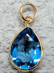 MaxSold Auction: Certified 10K(0.57g),  BLUE TOPAZ (2.2ct) PENDANT - Toronto (Ontario, Canada) PARTNER MANAGED Downsizing Online Auction - Queen Street East