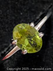 MaxSold Auction: Silver Peridot Ring,size 7  - Toronto (Ontario, Canada) PARTNER MANAGED Downsizing Online Auction - Queen Street East