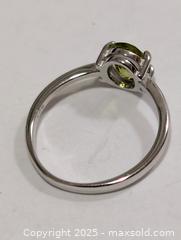 MaxSold Auction: Silver Peridot Ring,size 7  - Toronto (Ontario, Canada) PARTNER MANAGED Downsizing Online Auction - Queen Street East