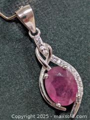 MaxSold Auction: Silver RubyCZ Pendant  - Toronto (Ontario, Canada) PARTNER MANAGED Downsizing Online Auction - Queen Street East
