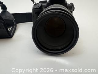 MaxSold Auction: Canon EOS camera with 2 zoom lenses - Toronto (Ontario, Canada) SELLER MANAGED Downsizing Online Auction - Westminster Avenue