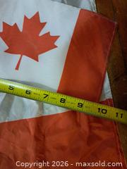 MaxSold Auction: Lot of 2 Canadian Flags: 36 x 72 in Large Nylon + Handheld - Victoria (British Columbia, Canada) PARTNER MANAGED Estate Sale Online Auction - Hillside Avenue