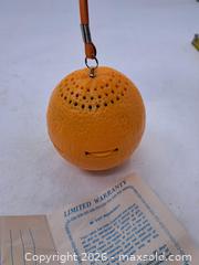 MaxSold Auction: Novelty Orange-Shaped Portable AM/FM Keychain Radio - Victoria (British Columbia, Canada) PARTNER MANAGED Estate Sale Online Auction - Hillside Avenue