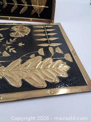 MaxSold Auction: Pair of Brass-Relief Botanical Wall Plaques on Black Backing - Victoria (British Columbia, Canada) PARTNER MANAGED Estate Sale Online Auction - Hillside Avenue