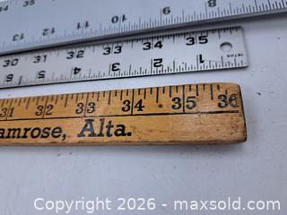 MaxSold Auction: Set of 3 Measuring Sticks - Wood and Aluminum - Victoria (British Columbia, Canada) PARTNER MANAGED Estate Sale Online Auction - Hillside Avenue