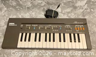 MaxSold Auction: Yamaha PSS-30 32-Key Portable Electronic Keyboard (brown) - Norwood (Pennsylvania, USA) SELLER MANAGED Downsizing Online Auction - Martin Lane