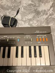 MaxSold Auction: Yamaha PSS-30 32-Key Portable Electronic Keyboard (brown) - Norwood (Pennsylvania, USA) SELLER MANAGED Downsizing Online Auction - Martin Lane