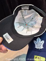 MaxSold Auction: 2 TORONTO MAPLE LEAFS CAPS. NEW - Hamilton (Ontario, Canada) SELLER MANAGED Estate Sale Online Auction - St. Clair Avenue