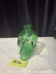 MaxSold Auction: GREEN GLASS BOTTLE SKULL. - Hamilton (Ontario, Canada) SELLER MANAGED Estate Sale Online Auction - St. Clair Avenue