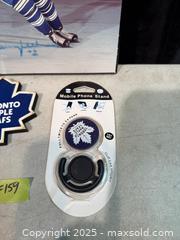 MaxSold Auction: TORONTO MAPLELEAFS NHL ZAMBONI TIN BANK, PRINT AND MORE. - Hamilton (Ontario, Canada) SELLER MANAGED Estate Sale Online Auction - St. Clair Avenue