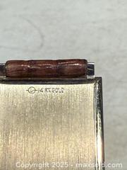 MaxSold Auction: VTG 14K GOLD MOVADO WATCH NEW LEATHER BAND.  - Hamilton (Ontario, Canada) SELLER MANAGED Estate Sale Online Auction - St. Clair Avenue