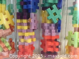 MaxSold Auction: Lot/4 Tubes Of Mini Building Blocks - Hamilton (Ontario, Canada) SELLER MANAGED Downsizing Online Auction - Moffat Road