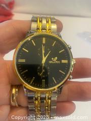 MaxSold Auction: Men’s Orlando Quartz Watch - Hamilton (Ontario, Canada) SELLER MANAGED Downsizing Online Auction - Moffat Road