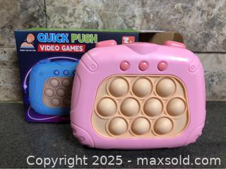 MaxSold Auction: Quick Push Video Game Fidget Toy - Hamilton (Ontario, Canada) SELLER MANAGED Downsizing Online Auction - Moffat Road