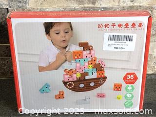 MaxSold Auction: Wooden Animal Balance Stacking Toy - Hamilton (Ontario, Canada) SELLER MANAGED Downsizing Online Auction - Moffat Road