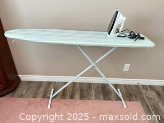 MaxSold Auction: Black & Decker ironing board with iron, light blue striped cover - Waterloo (Ontario, Canada) SELLER MANAGED Estate Sale Online Auction -  New Hampshire Street