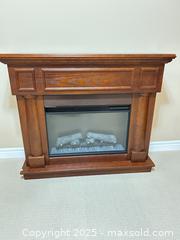 MaxSold Auction: Cherry Electric Fireplace Mantel with Glass Front Panel - Waterloo (Ontario, Canada) SELLER MANAGED Estate Sale Online Auction -  New Hampshire Street
