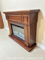 MaxSold Auction: Cherry Electric Fireplace Mantel with Glass Front Panel - Waterloo (Ontario, Canada) SELLER MANAGED Estate Sale Online Auction -  New Hampshire Street