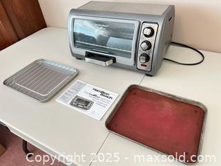 MaxSold Auction: Hamilton Beach Easy Reach Toaster Oven, 6-Slice, Silver/Dark Gray. Working condition  - Waterloo (Ontario, Canada) SELLER MANAGED Estate Sale Online Auction -  New Hampshire Street